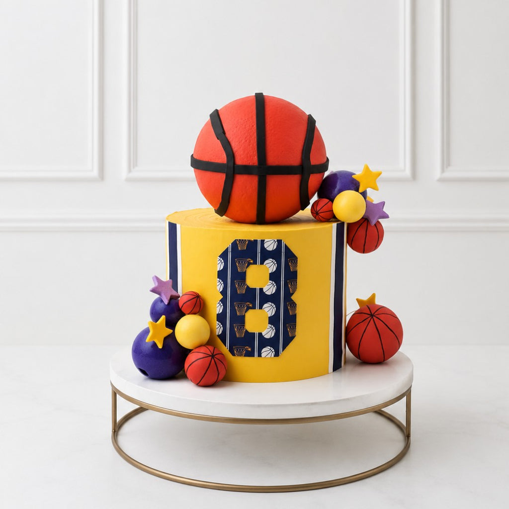 Decorative cake with basketball theme on a white background