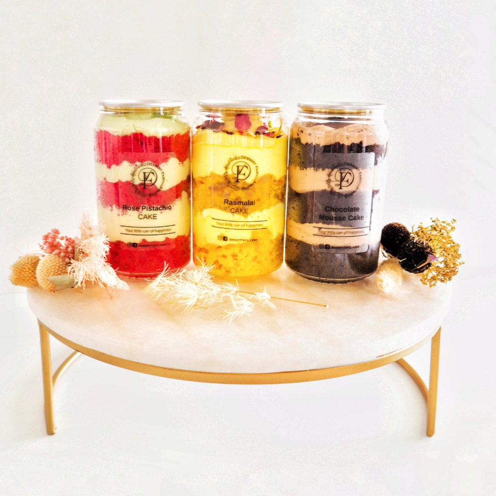 3 can dessert sitting on marble stand